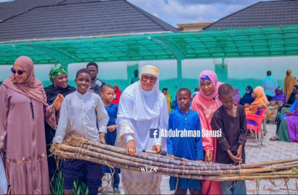 Wife of House of Reps member trends amid reports she shared sugar cane to “empower” youths in her community